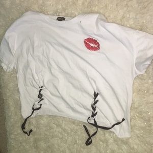 Cue white with ties and a kiss shirt